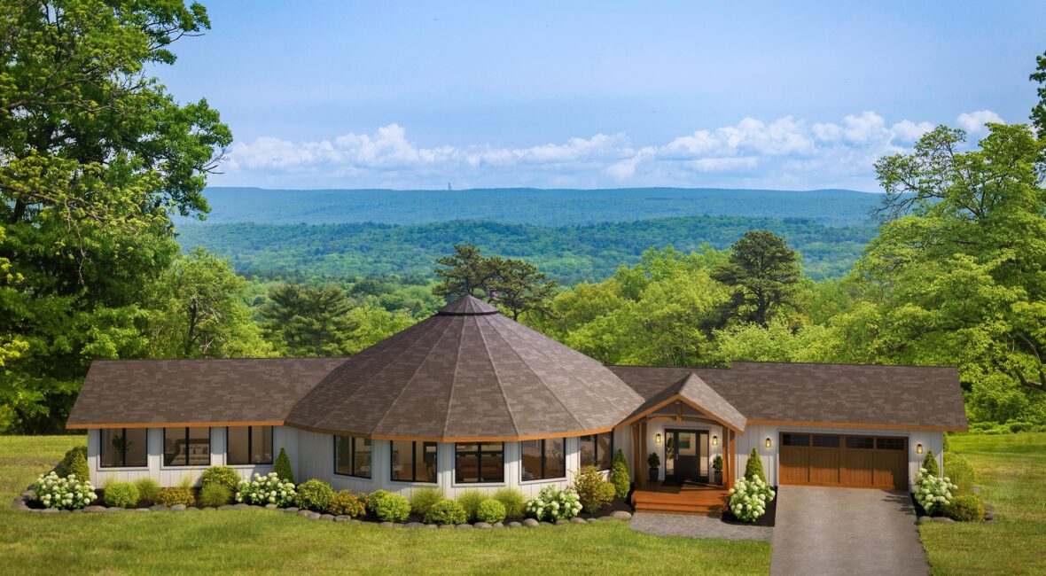 Crest 41-G round home with two wings and a Timber-style covered porch overlooking forested hills