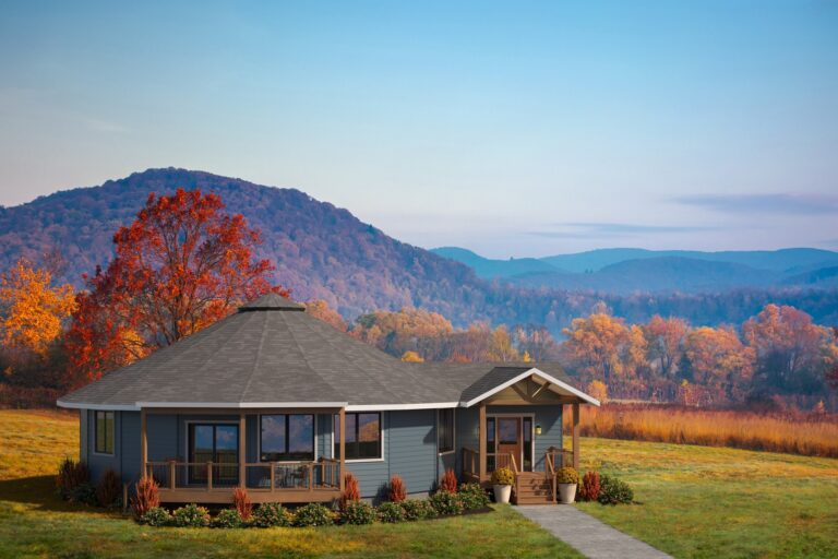 Headland 47-A round home with engineered wood siding and Timber-style covered porch, without an attached garage